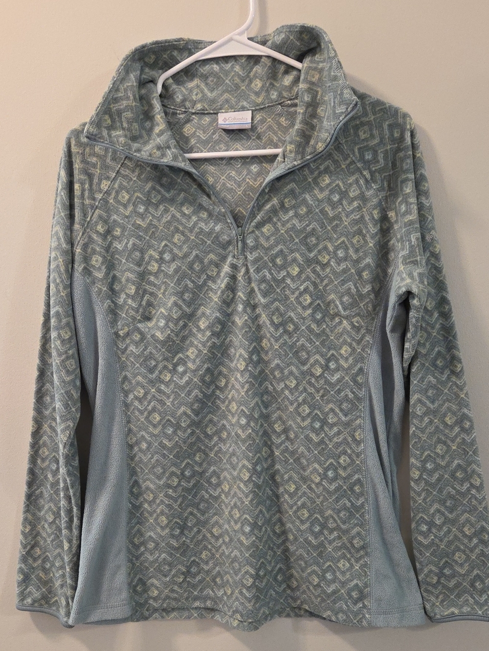 Columbia Women's Fleece Pullover features a geometric pattern and a 1/4 zip